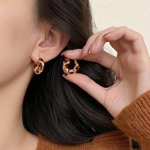 Light luxury, high-end temperament, enamel ear buckle design, popular earrings, French drop glazed leopard print circle earrings