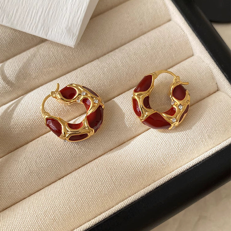 Light luxury, high-end temperament, enamel ear buckle design, popular earrings, French drop glazed leopard print circle earrings